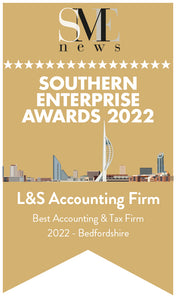 The newest logo displaying that we are the best Accounting Firm in Bedfordshire on a gold background and a picture of the London's buildings in the middle.
